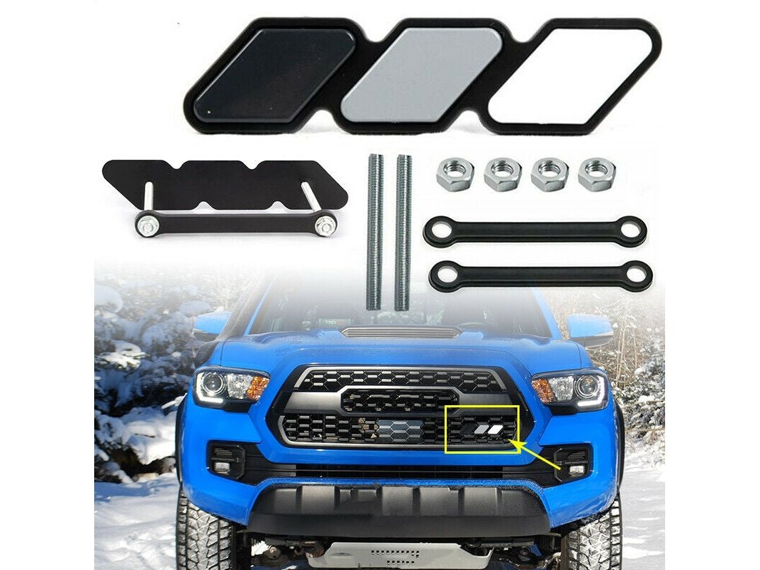 Tacoma grille badge